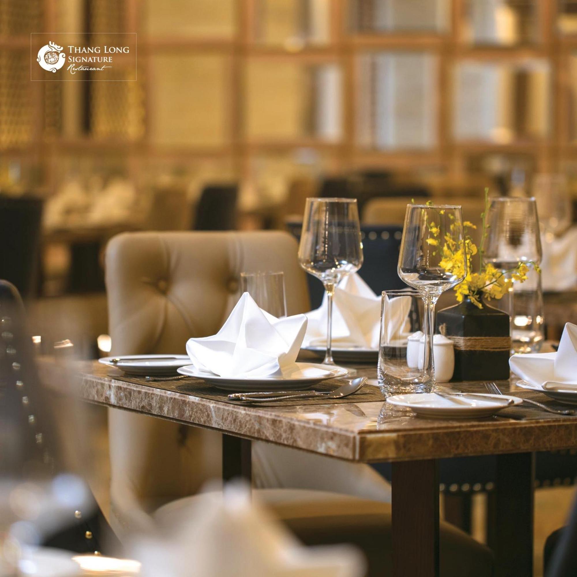 The Oriental Jade Hotel Ханой Екстер'єр фото A table set for fine dining